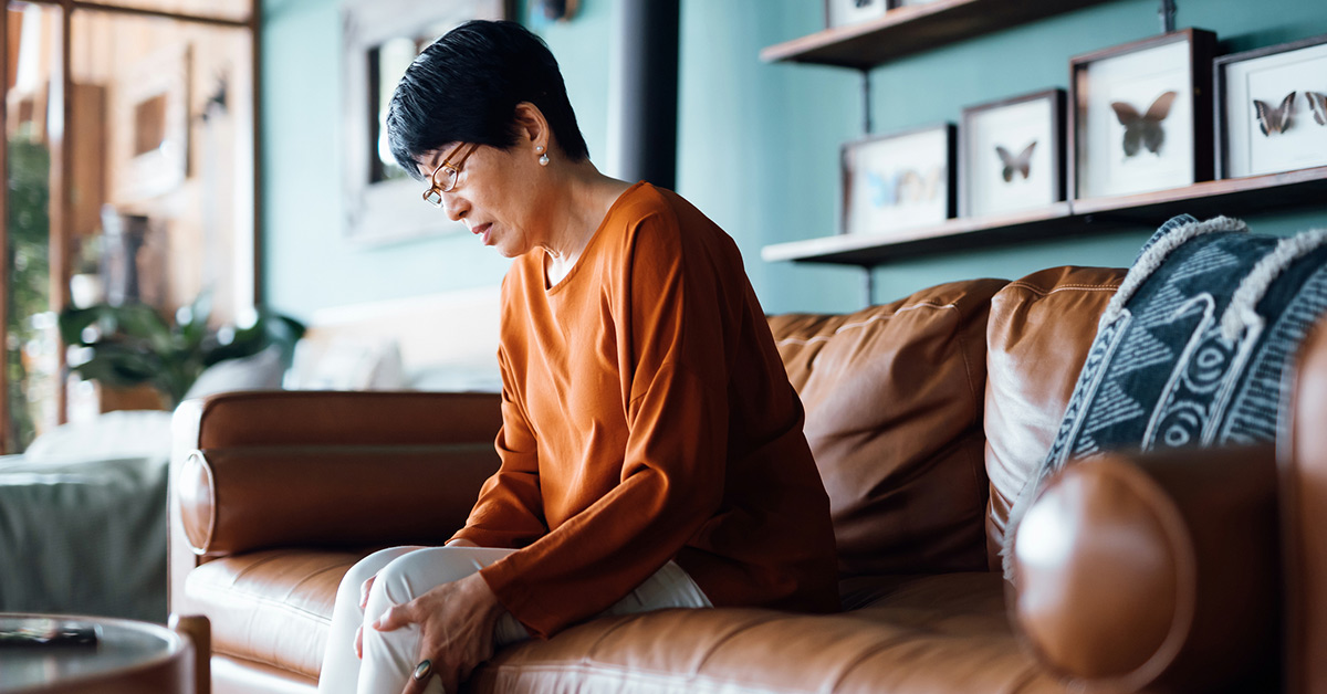 woman having osteoarthritis pain